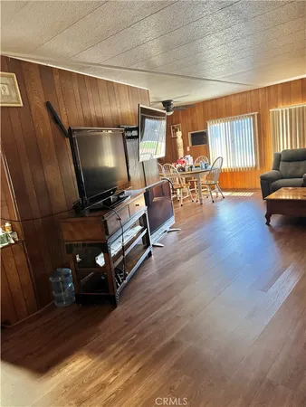 a kitchen with a dining table and chairs