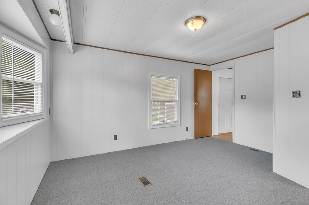 46 Contessa Lane Springfield, MA 01119 - Photo 15 of 25 a view of an empty room with a window