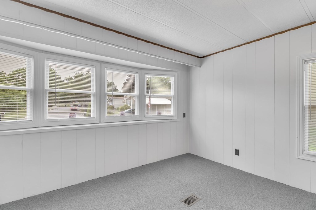 46 Contessa Lane Springfield, MA 01119 - Photo 16 of 25 a view of an empty room with a window