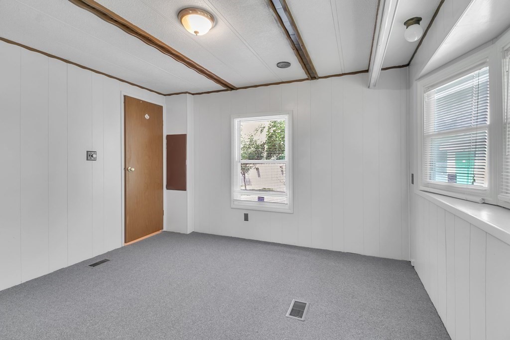 46 Contessa Lane Springfield, MA 01119 - Photo 20 of 25 a view of an empty room with a window