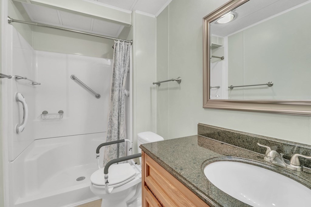 46 Contessa Lane Springfield, MA 01119 - Photo 21 of 25 a bathroom with a granite countertop sink toilet and shower