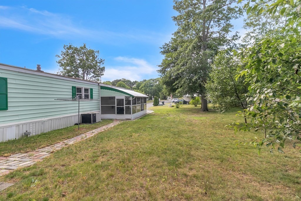 46 Contessa Lane Springfield, MA 01119 - Photo 3 of 25 a house view with a garden space