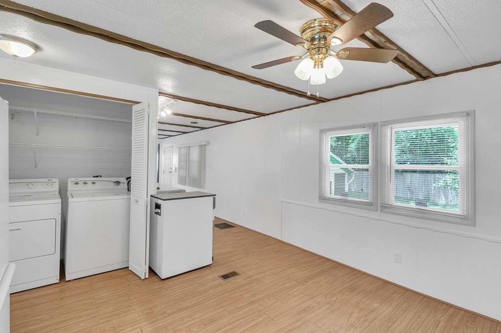 46 Contessa Lane Springfield, MA 01119 - Photo 8 of 25 a view of a livingroom with washer and dryer