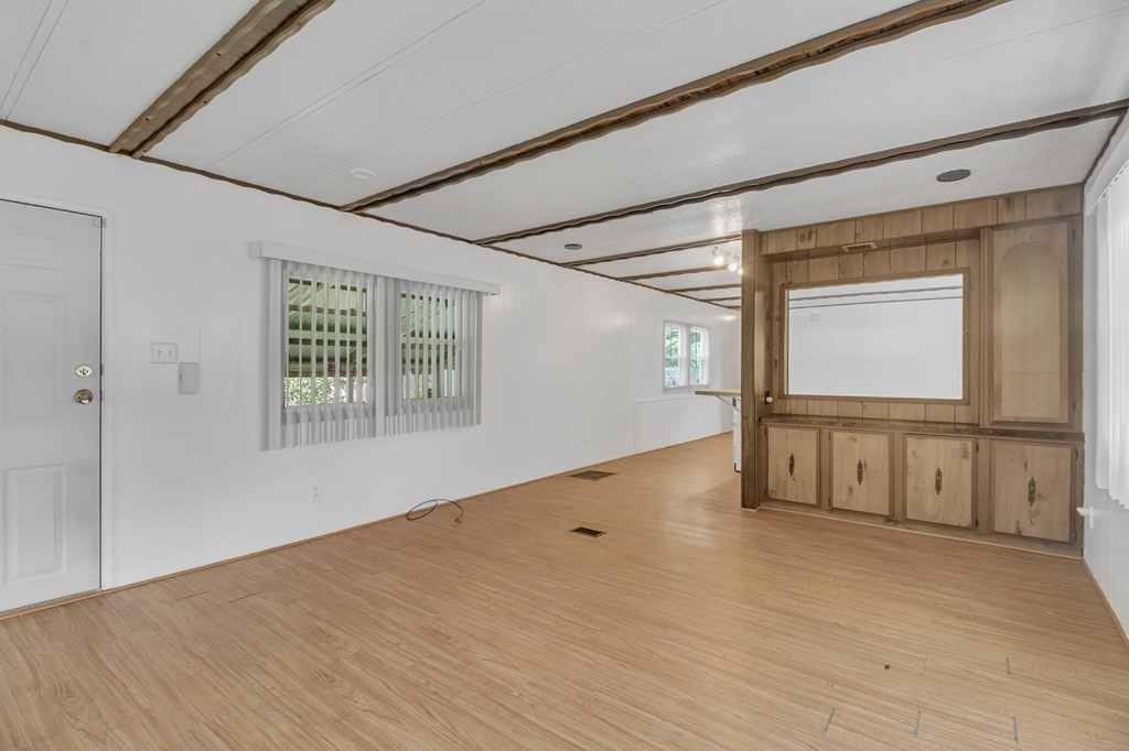 46 Contessa Lane Springfield, MA 01119 - Photo 9 of 25 a view of an empty room with a window