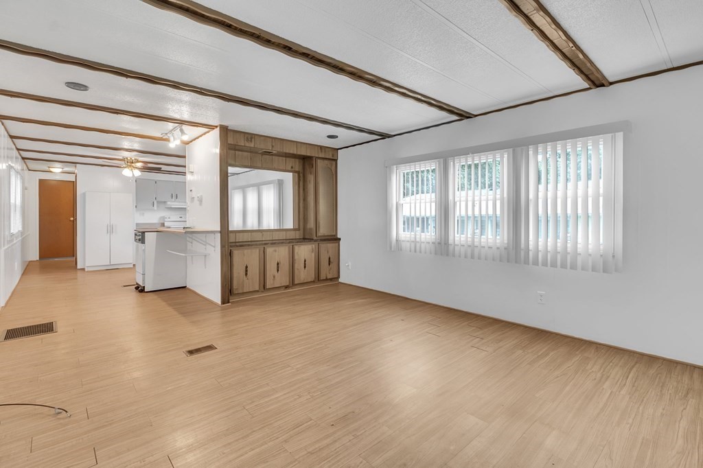 46 Contessa Lane Springfield, MA 01119 - Photo 10 of 25 a view of an empty room with a window