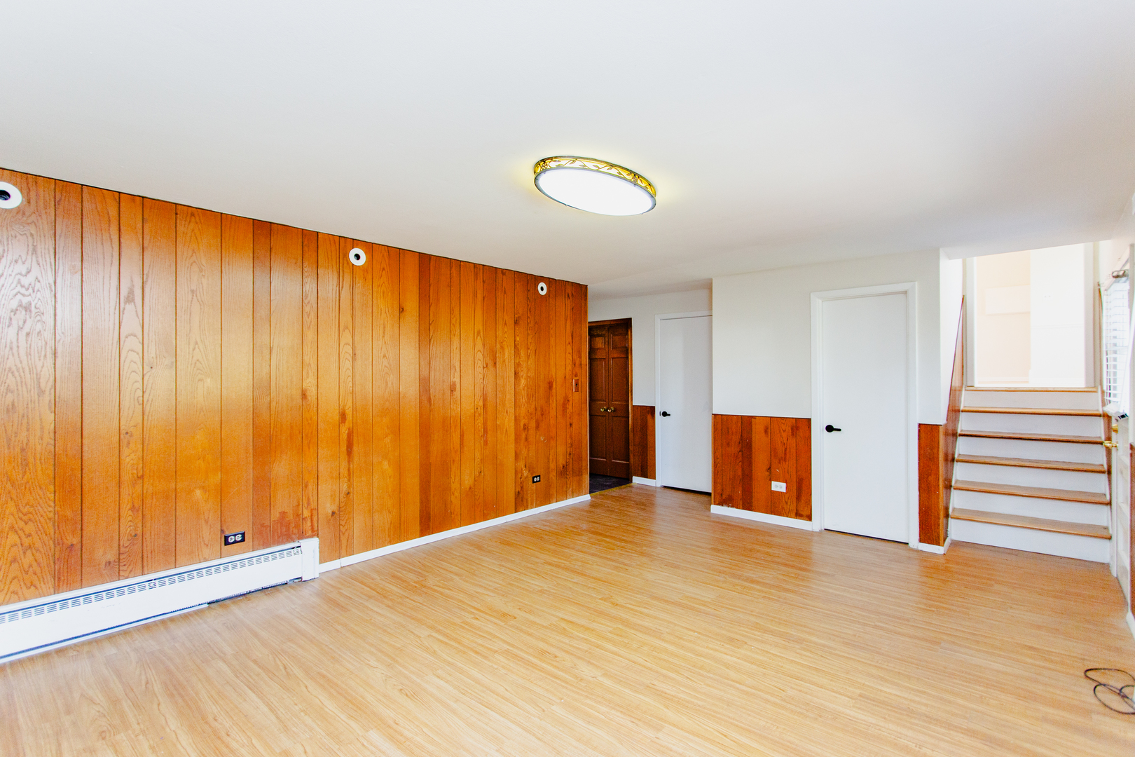 1503 Executive Lane Glenview, IL 60026 - Photo 17 of 40 wooden floor in an empty room with a window