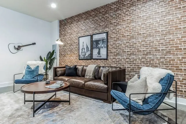 a view of a workspace with furniture