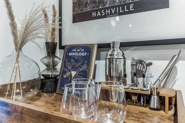 a living room with furniture and a wall
