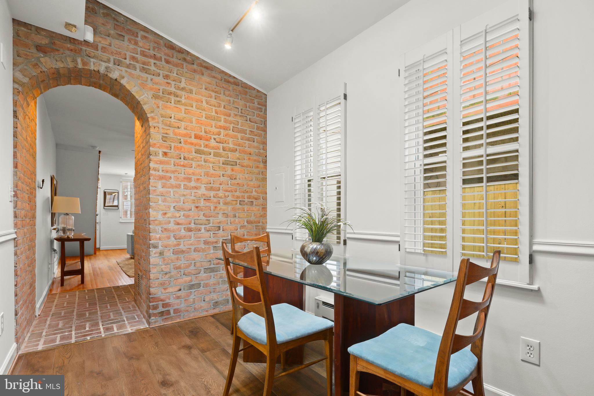2828 O Donnell Street Baltimore, MD 21224 - Photo 12 of 38 Dining Room with exposed brick