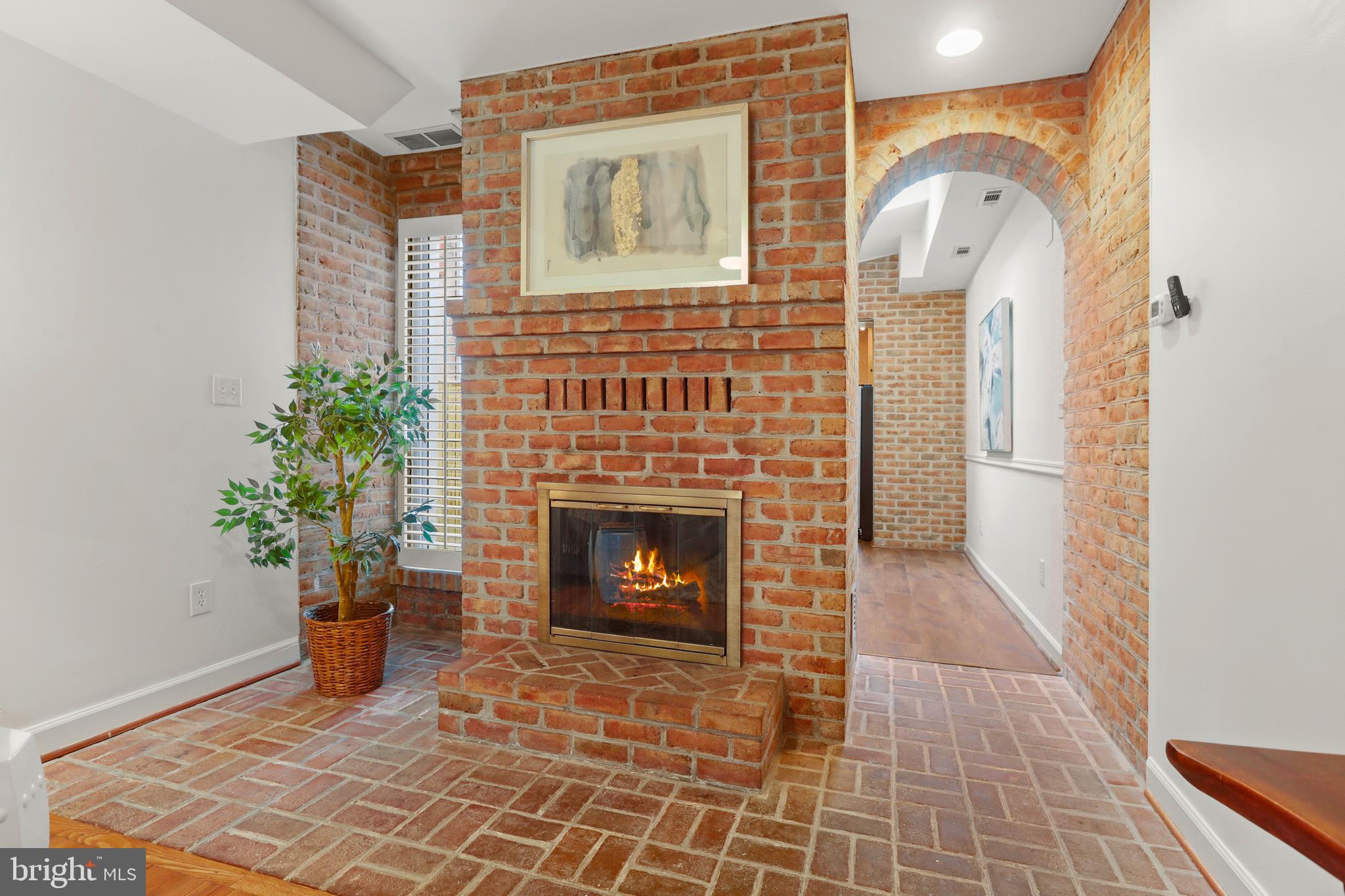 2828 O Donnell Street Baltimore, MD 21224 - Photo 9 of 38 Gorgeous masonry fireplace