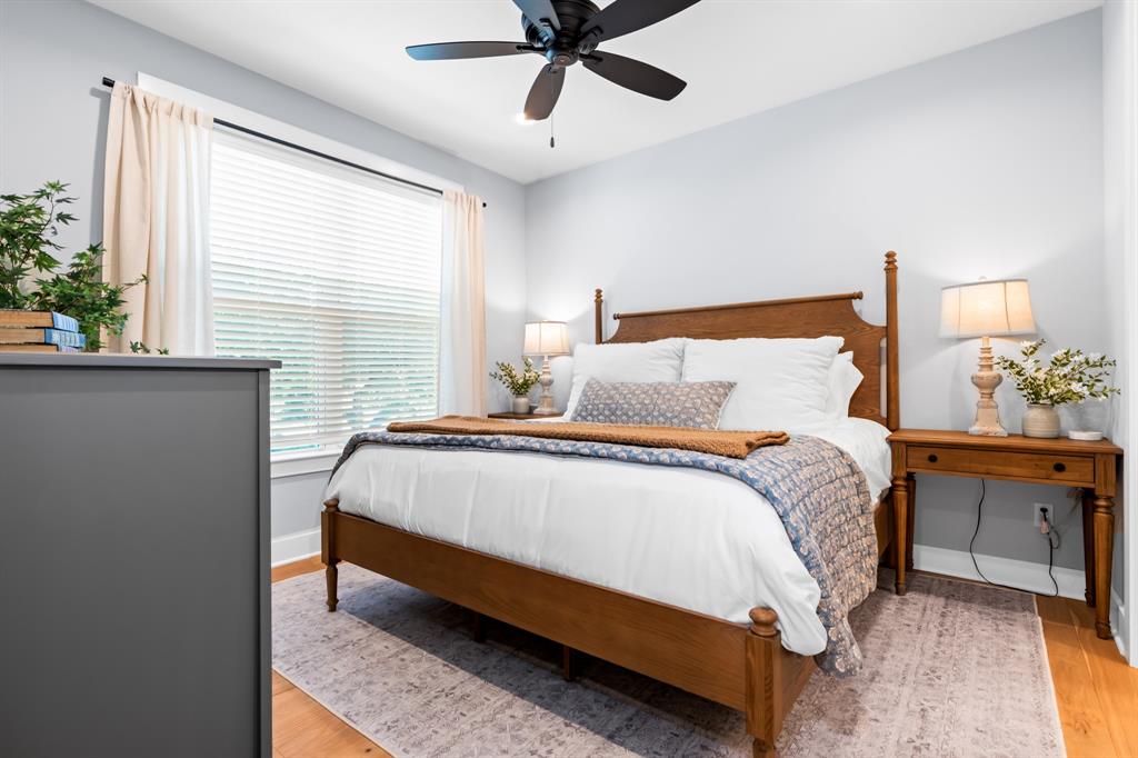 421 Proctor Avenue Waco, TX 76708 - Photo 12 of 28 a bed sitting in a bedroom next to a window