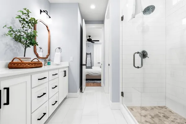 a bathroom with a toilet and a bathtub