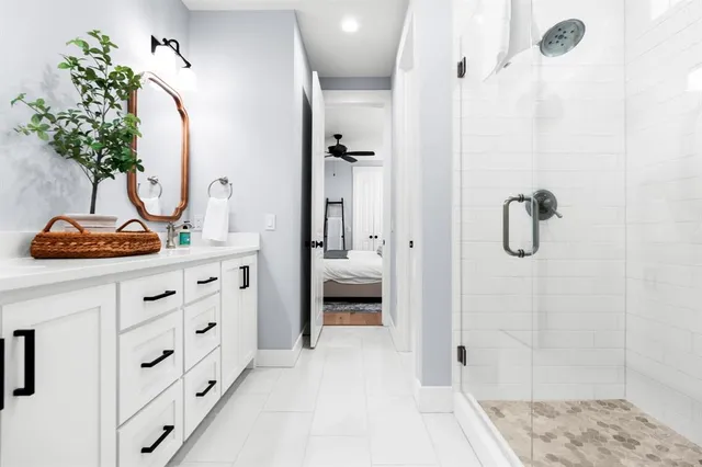 a bathroom with a toilet and a bathtub