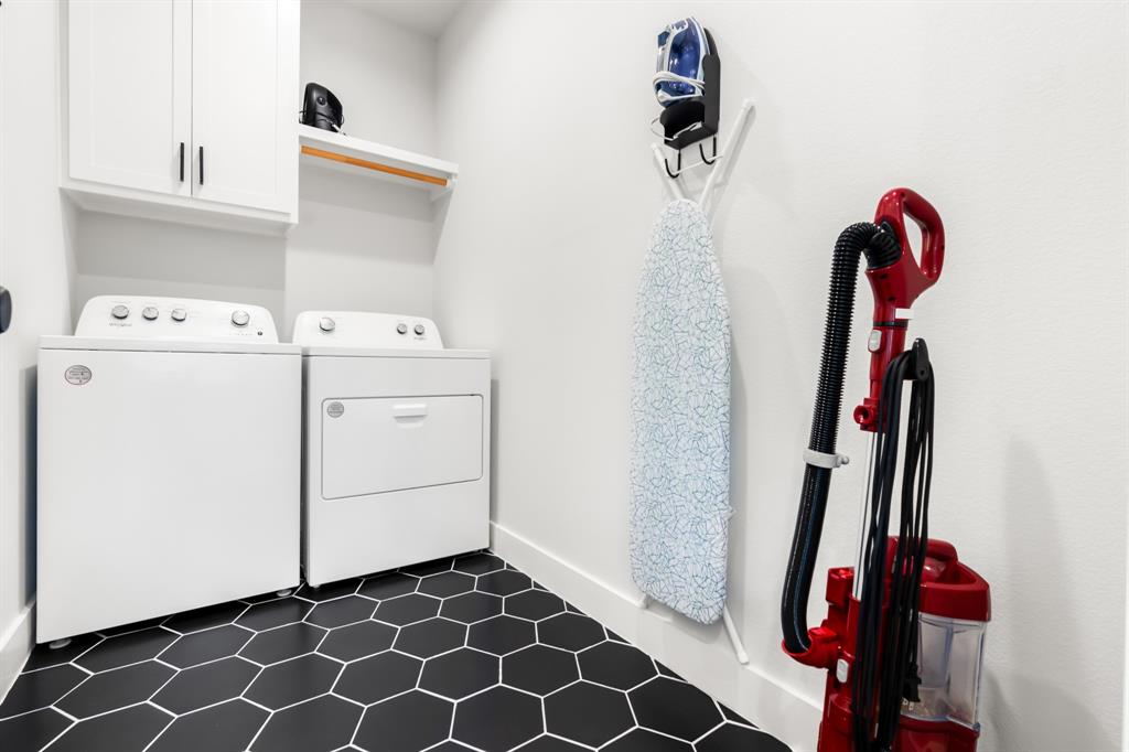 421 Proctor Avenue Waco, TX 76708 - Photo 22 of 28 a view of storage and utility room with stairs