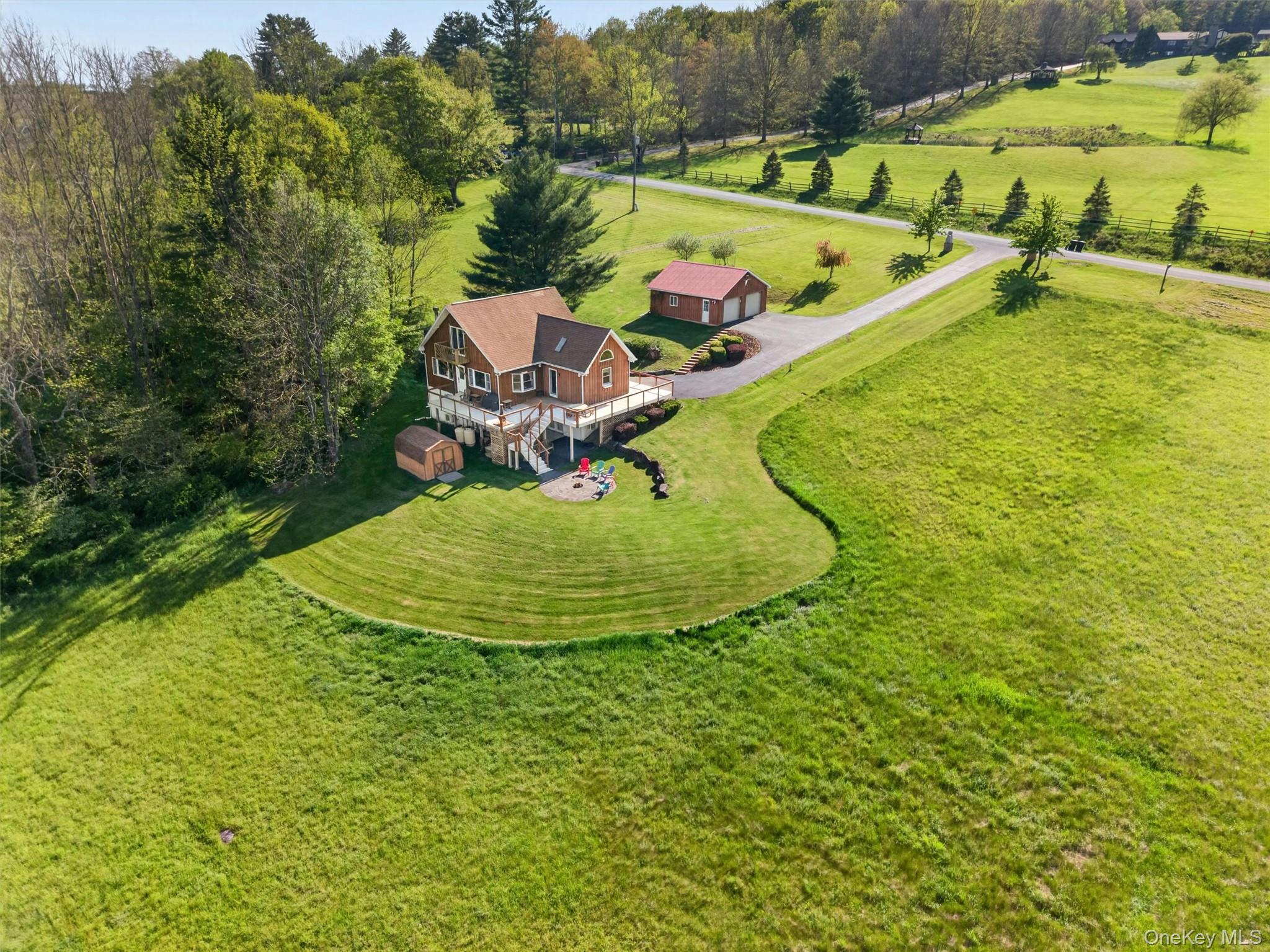 340 Hospital Road Callicoon, NY 12723 - Photo 1 of 41 a view of a swimming pool with a yard and outdoor seating