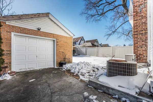 a front view of a house with a garage