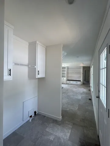 a view of an empty room and window