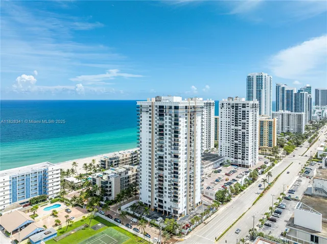 a view of a city with tall buildings