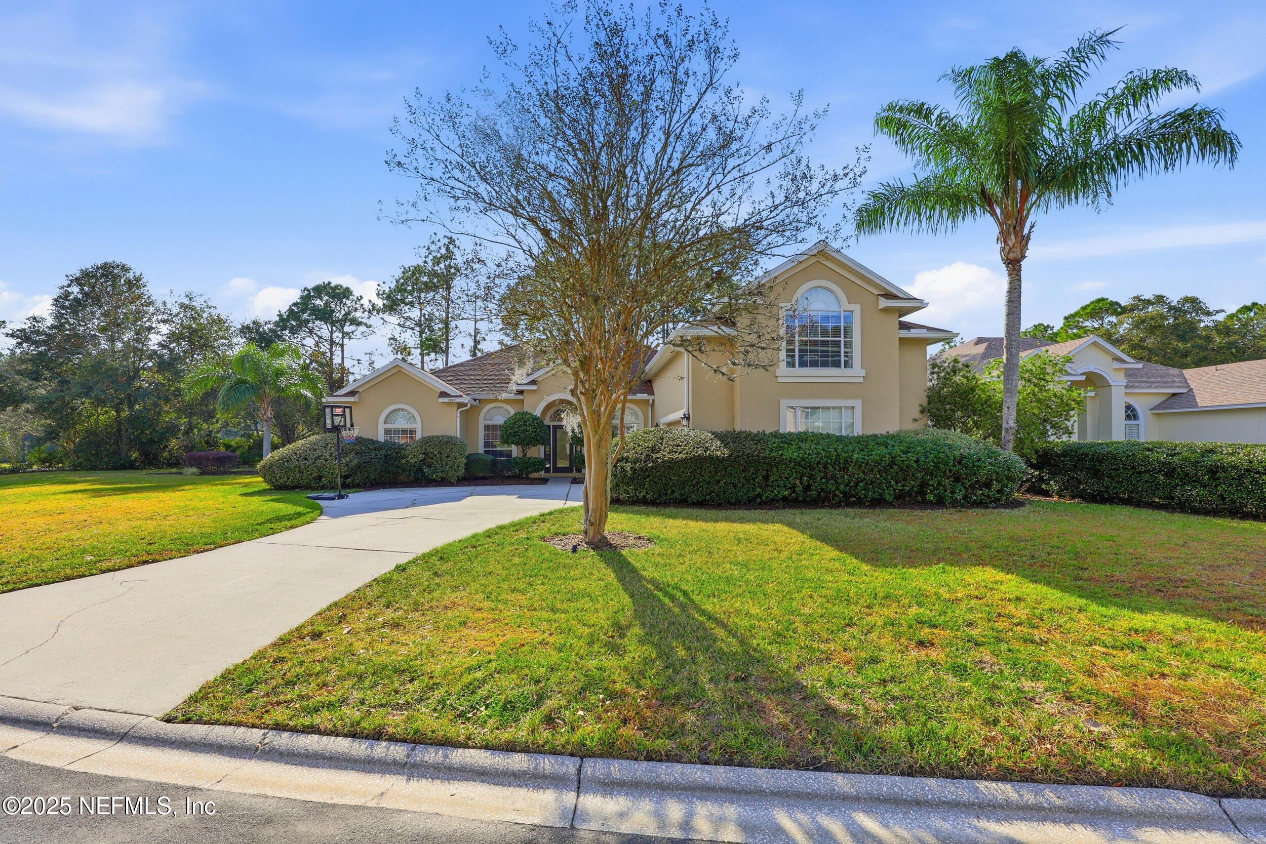 1605 Merroway Lane Ponte Vedra, FL 32081 - Photo 1 of 41 a front view of a house with garden