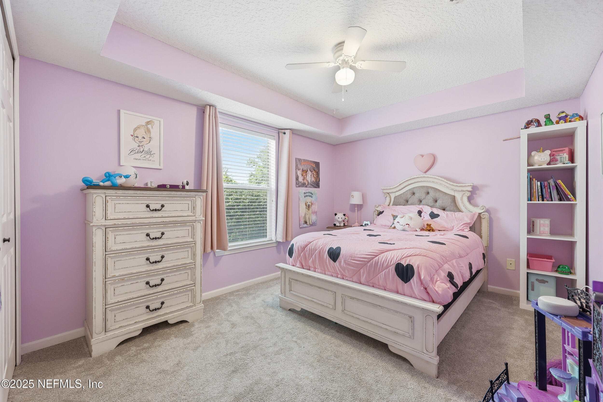 1605 Merroway Lane Ponte Vedra, FL 32081 - Photo 25 of 41 a bedroom with a bed and a baby crib