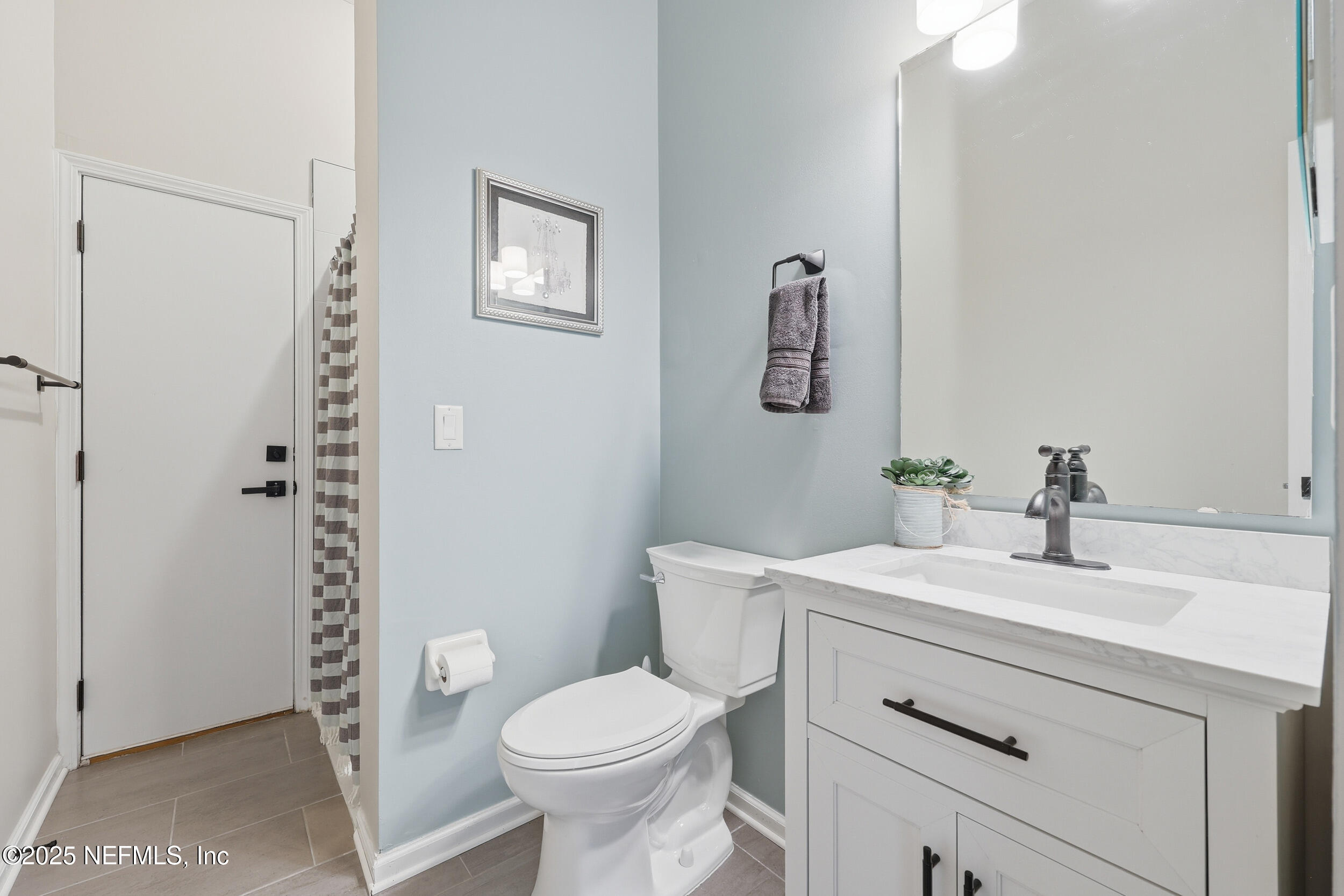 1605 Merroway Lane Ponte Vedra, FL 32081 - Photo 27 of 41 a bathroom with a sink a toilet and shower