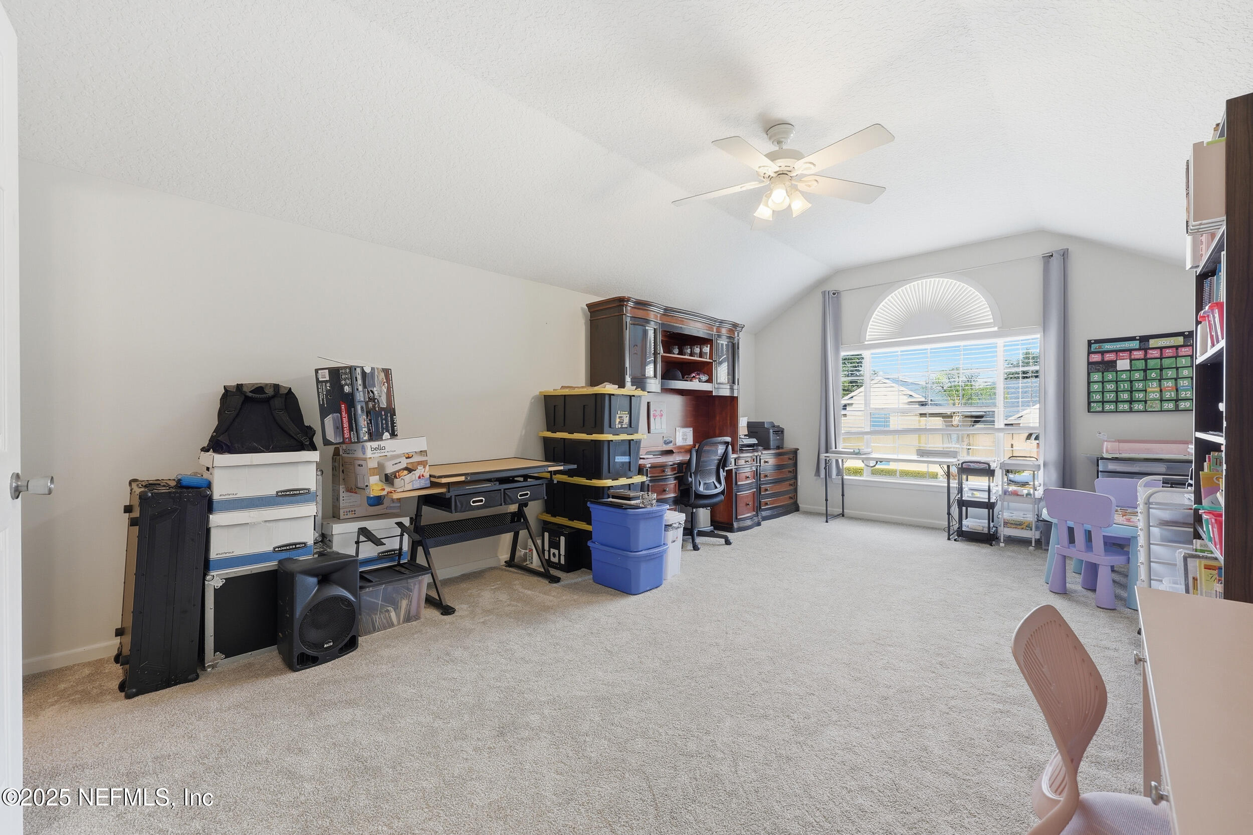 1605 Merroway Lane Ponte Vedra, FL 32081 - Photo 30 of 41 a living room with furniture and a chandelier