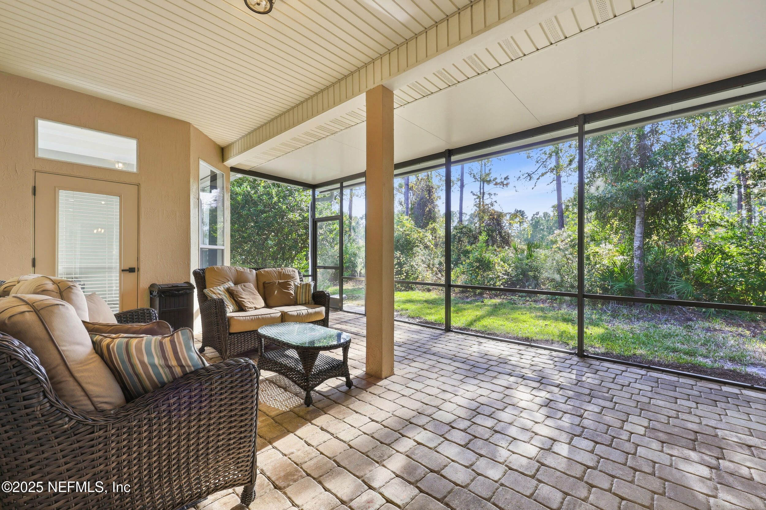 1605 Merroway Lane Ponte Vedra, FL 32081 - Photo 33 of 41 a living room with furniture and floor to ceiling windows