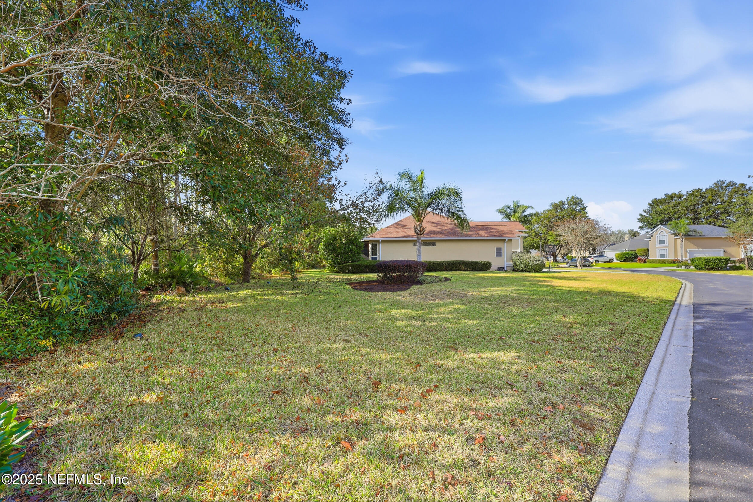 1605 Merroway Lane Ponte Vedra, FL 32081 - Photo 35 of 41 a front view of a house with a yard