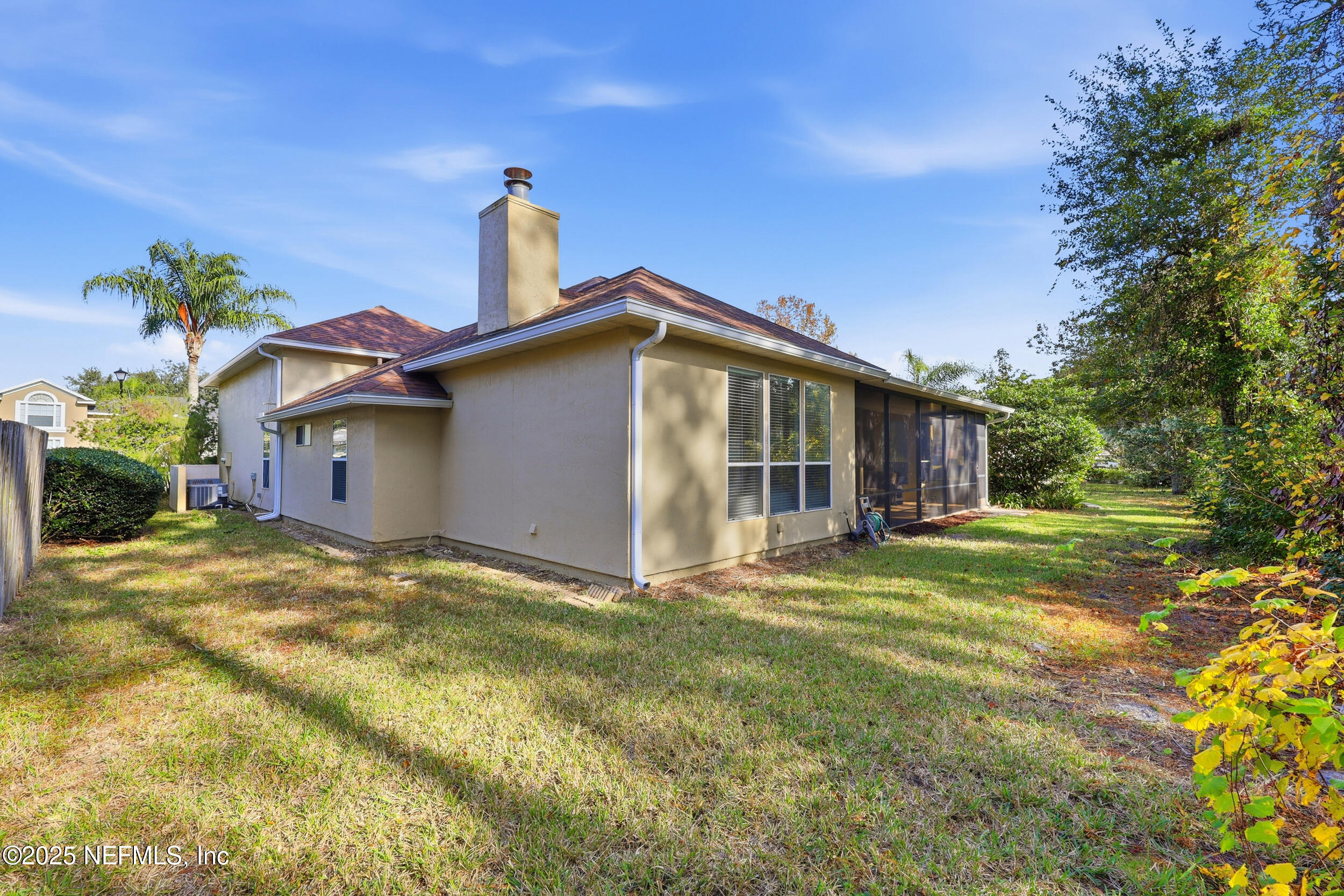 1605 Merroway Lane Ponte Vedra, FL 32081 - Photo 38 of 41 a view of a house with a yard and a garage