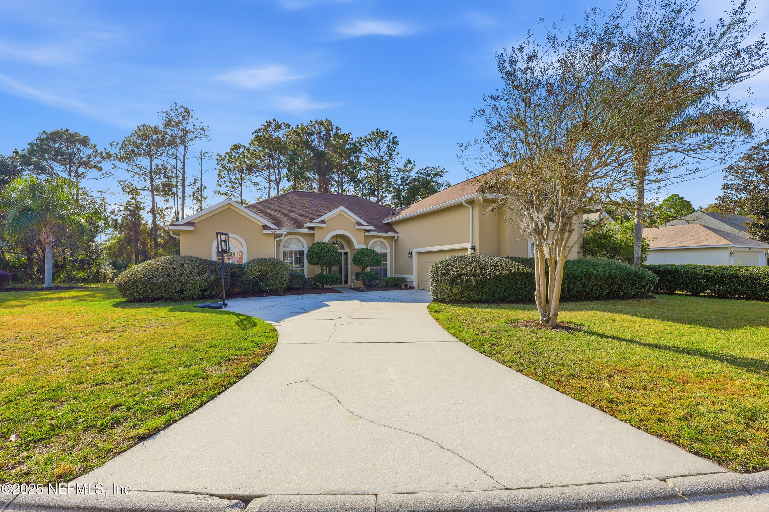 1605 Merroway Lane Ponte Vedra, FL 32081 - Photo 39 of 41 a view of a white house with a yard
