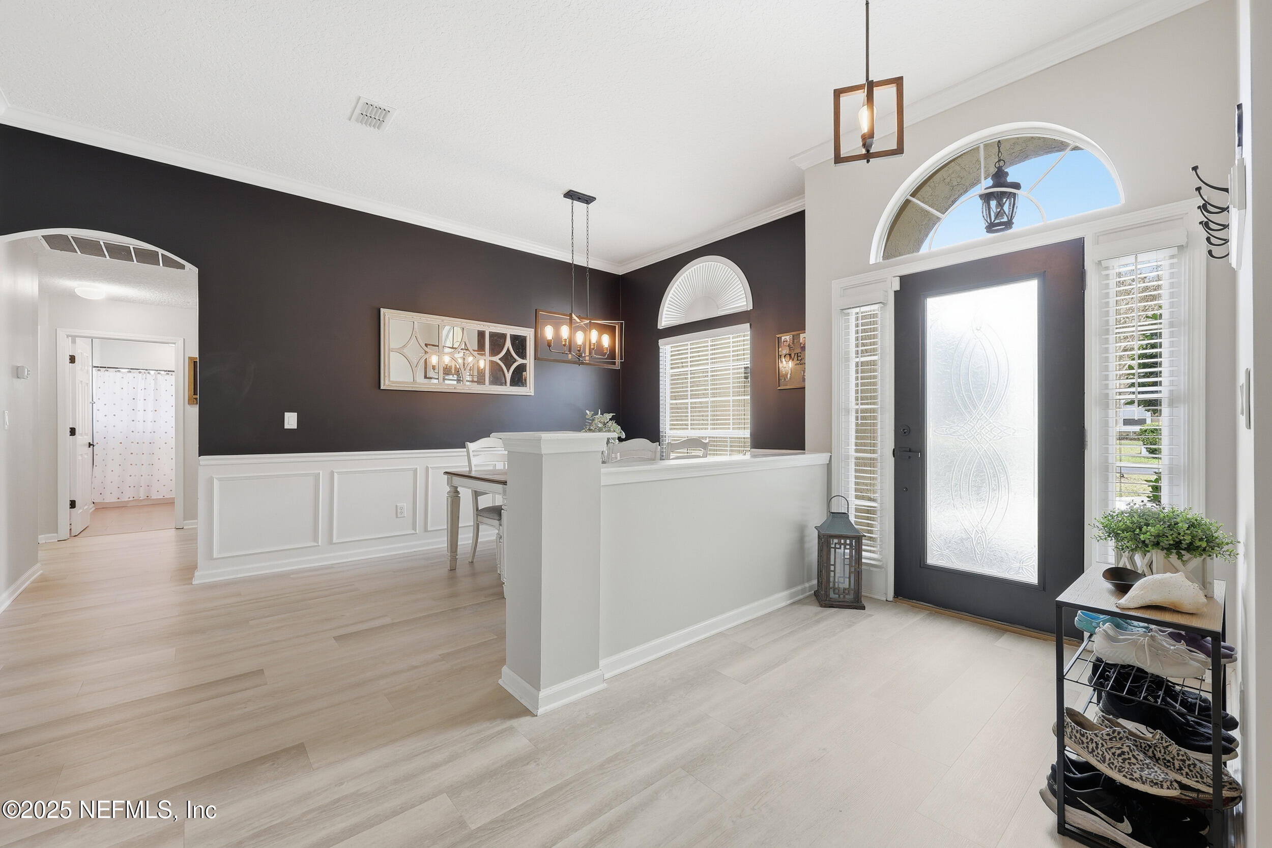 1605 Merroway Lane Ponte Vedra, FL 32081 - Photo 5 of 41 a view of a livingroom with furniture and a kitchen