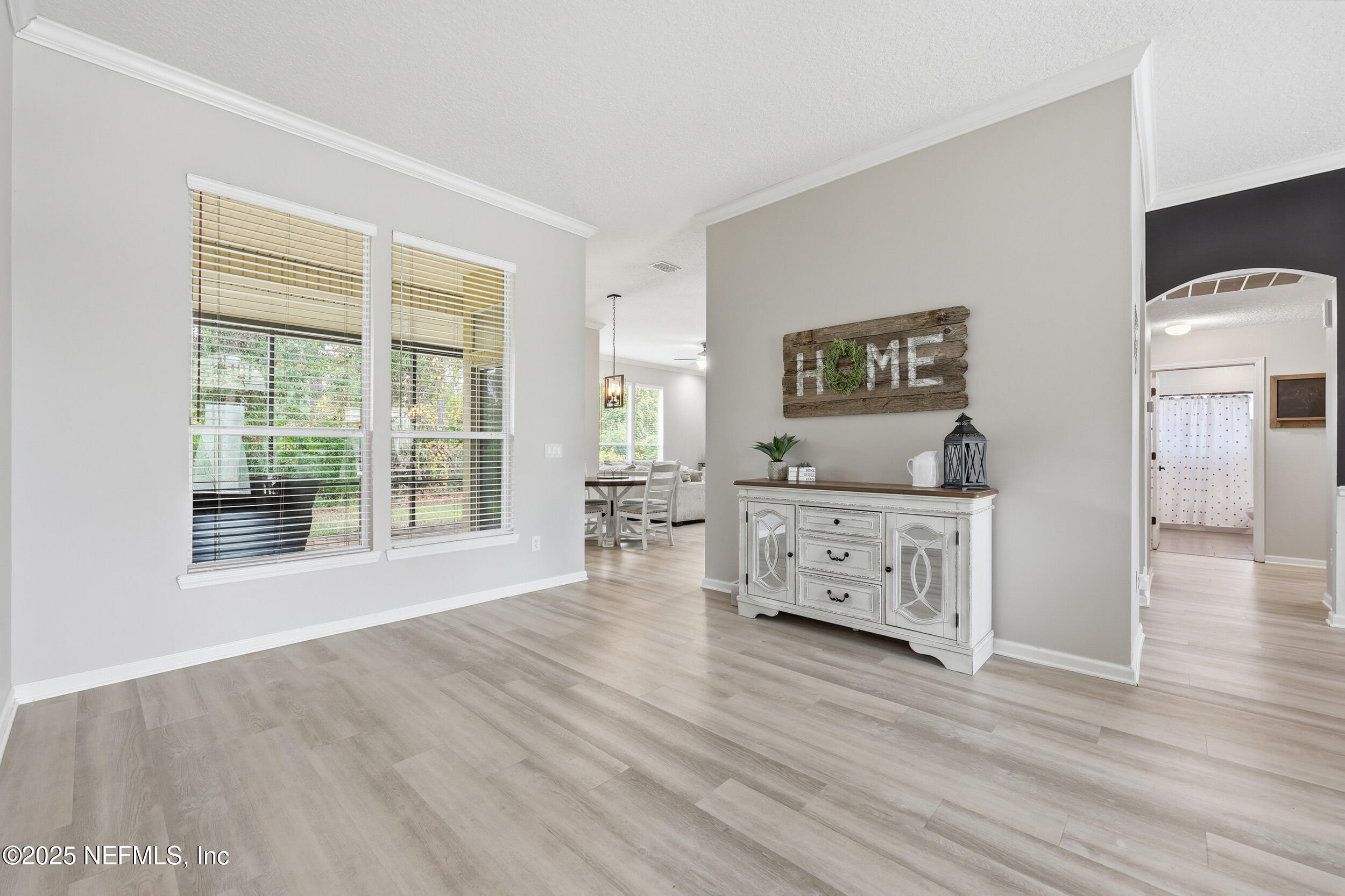 1605 Merroway Lane Ponte Vedra, FL 32081 - Photo 6 of 41 a living room with furniture and large windows