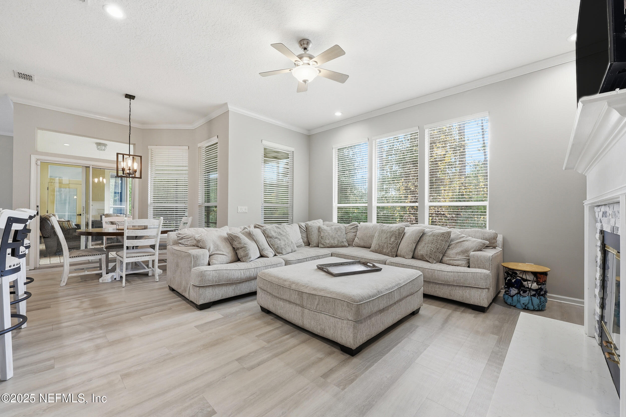 1605 Merroway Lane Ponte Vedra, FL 32081 - Photo 9 of 41 a living room with furniture and a large window