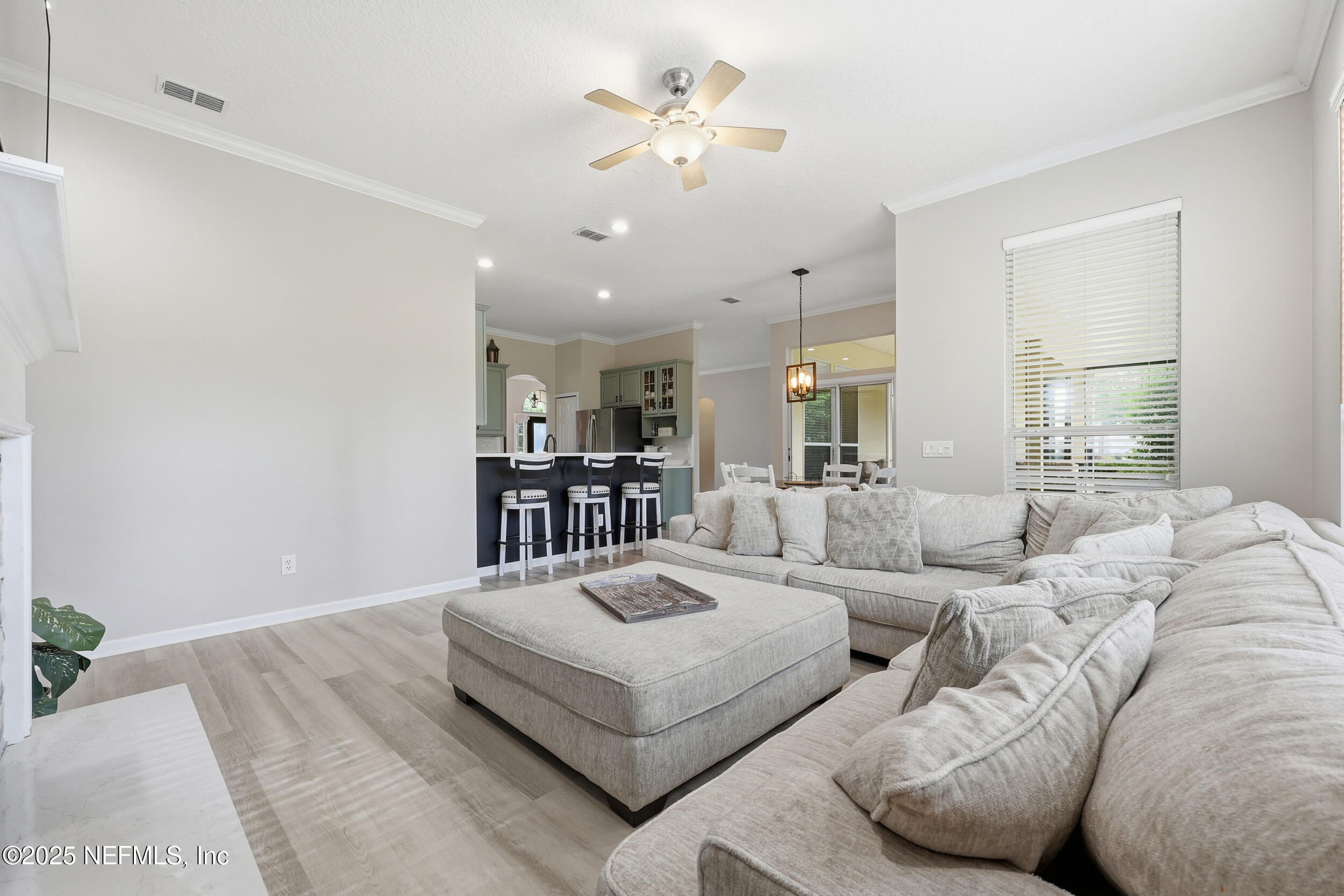 1605 Merroway Lane Ponte Vedra, FL 32081 - Photo 10 of 41 a living room with furniture and a large window
