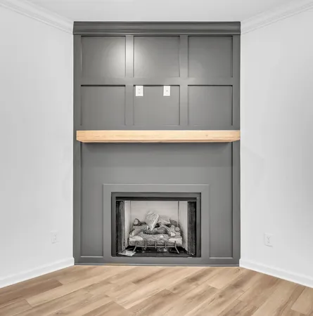 a fireplace with a wooden door