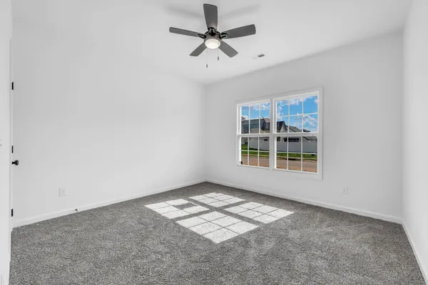 a view of a window in an empty room