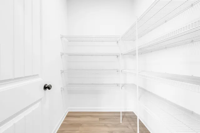a view of small space with racks on the wall