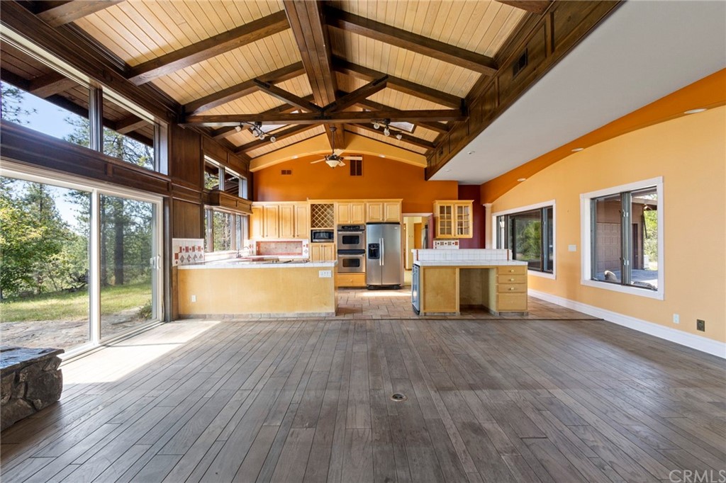 10379 McMahon Road Coulterville, CA 95311 - Photo 18 of 63 a view of a kitchen with wooden floor