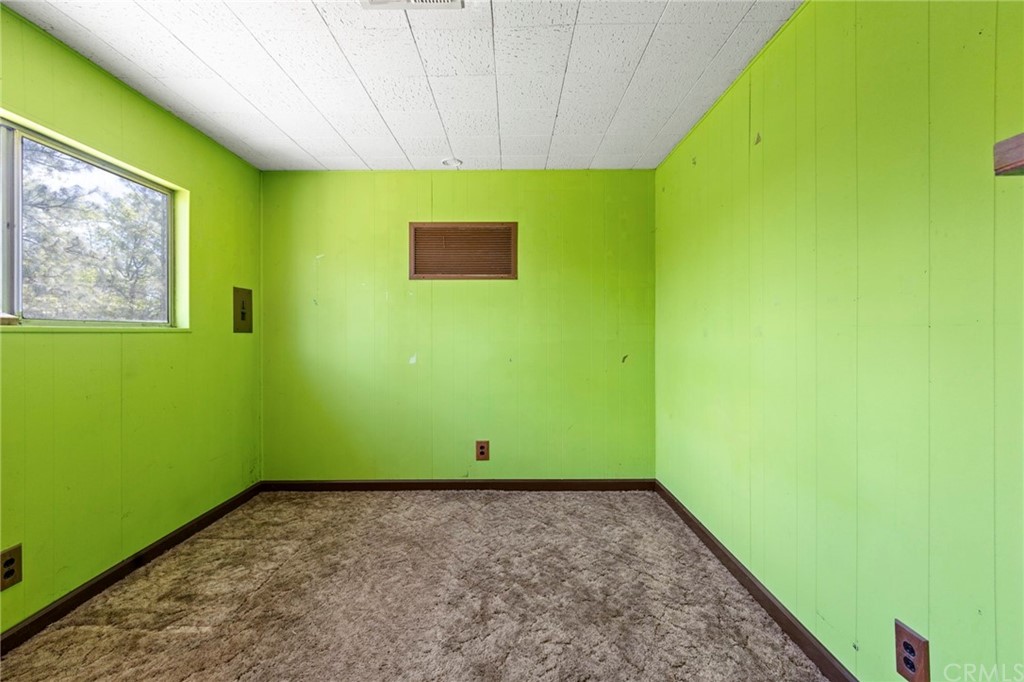10379 McMahon Road Coulterville, CA 95311 - Photo 50 of 63 a view of a room with a projector and a window