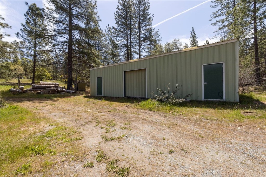 10379 McMahon Road Coulterville, CA 95311 - Photo 56 of 63 a view of a house with a yard
