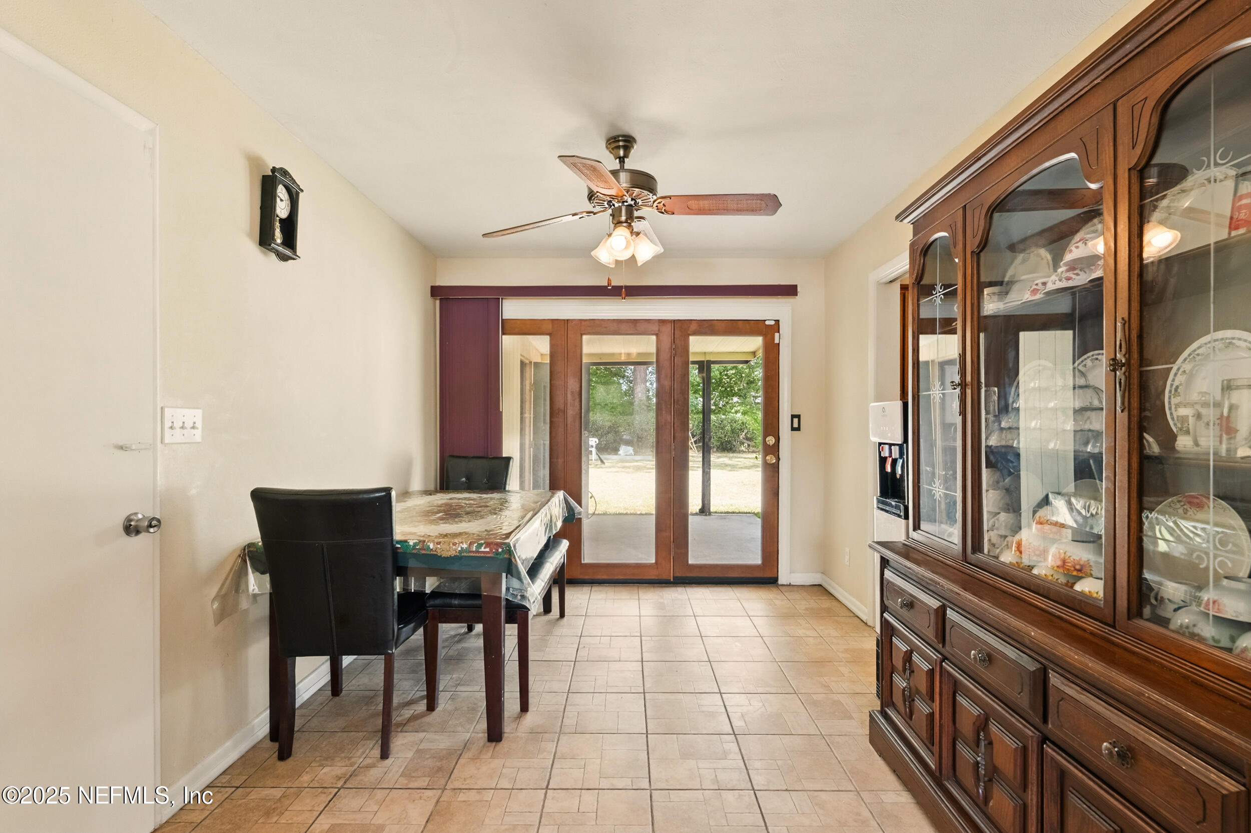 2826 Sam Road Jacksonville, FL 32216 - Photo 13 of 34 a view of a dining room with furniture window and outside view