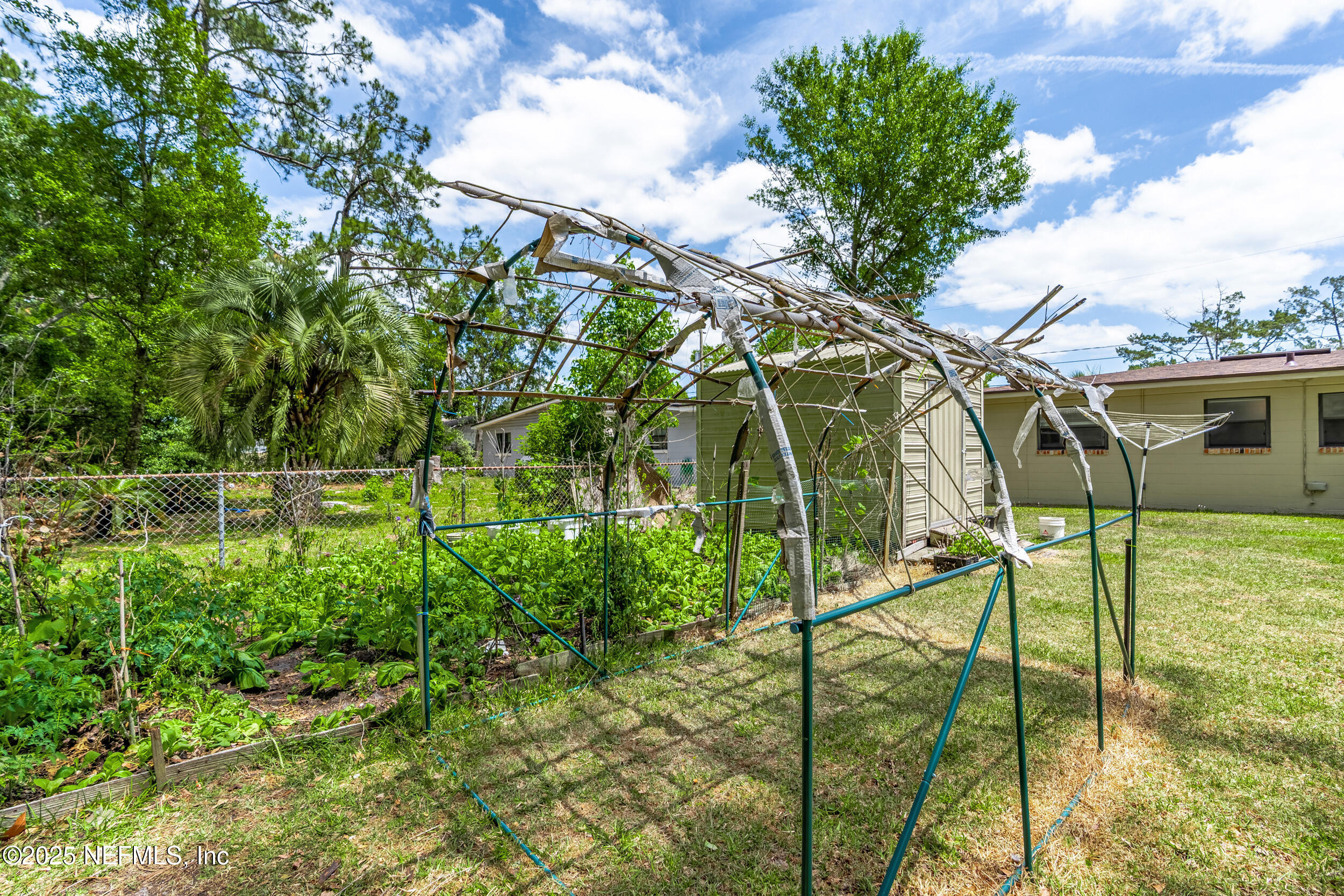 2826 Sam Road Jacksonville, FL 32216 - Photo 31 of 34 a view of outdoor space yard and mountain view