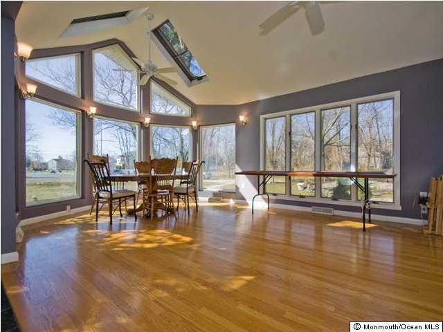 1448 Ocean Road Wall, NJ 07719 - Photo 2 of 3 a view of a swimming pool and outdoor space