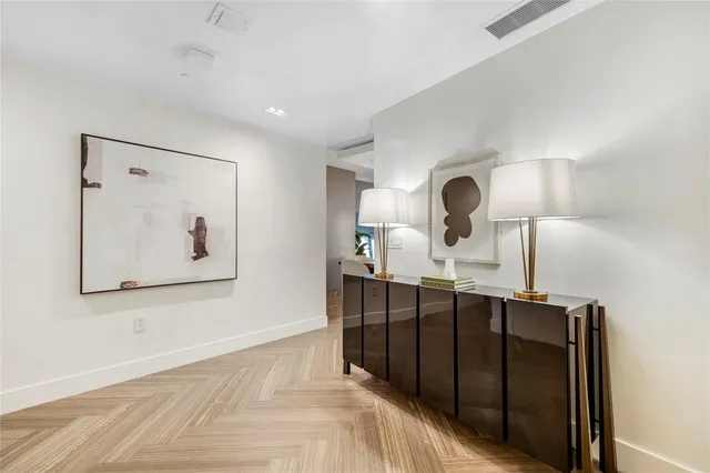 a bathroom with a double vanity sink and mirror
