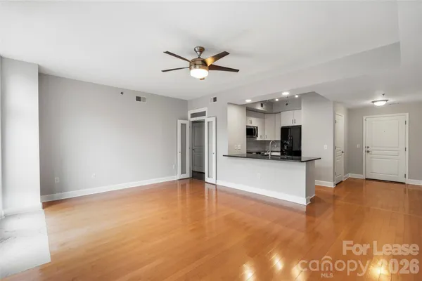 a view of an empty room and window