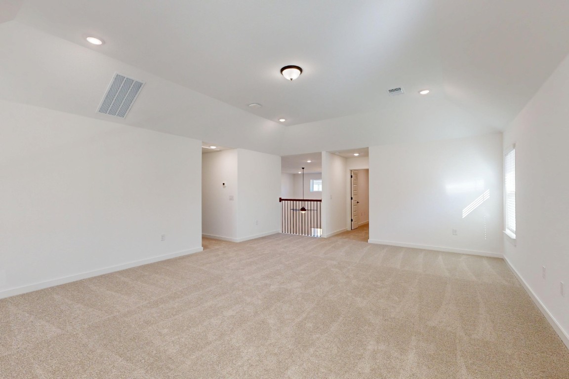 2020 Billings Way Leander, TX 78641 - Photo 23 of 35 a view of empty room with a kitchen