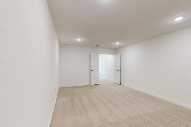 a bathroom with a sink and mirror