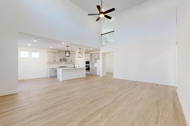 a view of kitchen with wooden floor