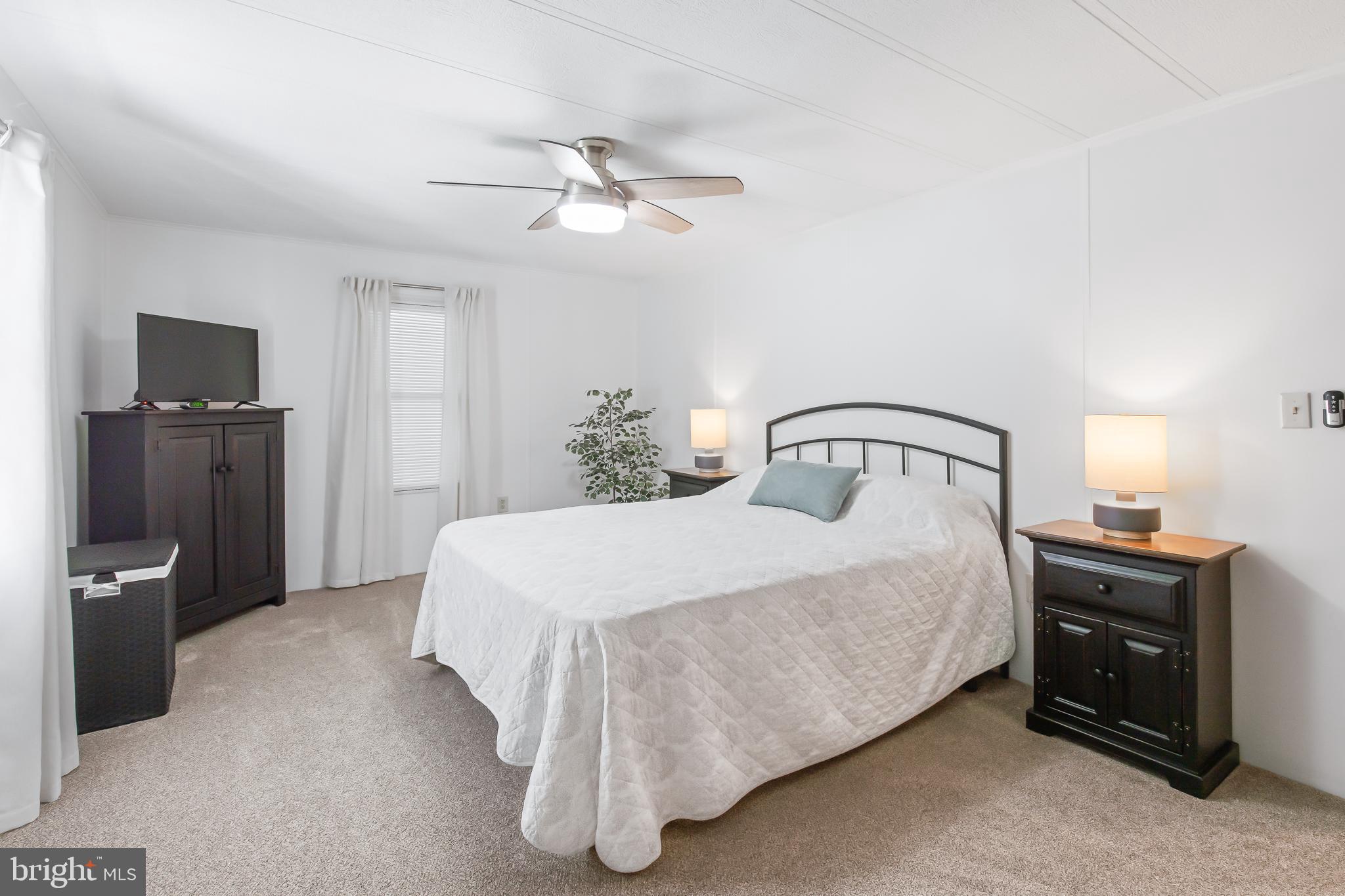 411 Maple Avenue Manheim, PA 17545 - Photo 18 of 35 a bedroom with a bed and dresser