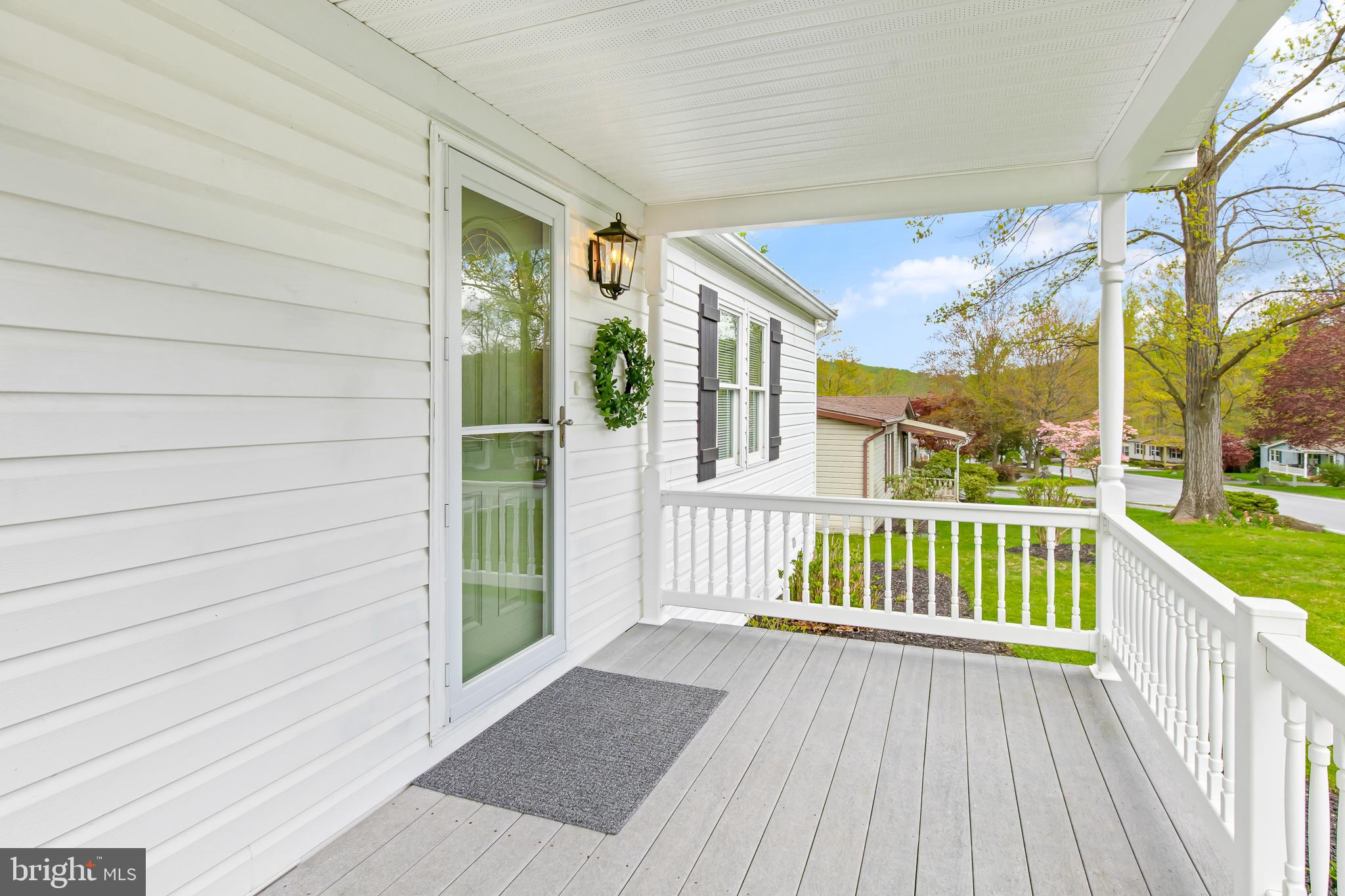 411 Maple Avenue Manheim, PA 17545 - Photo 2 of 35 a view of a house with a wooden deck